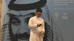 Economic conference delegate in front of a portrait of Saudi Crown Prince Mohammed bin Salman in Riyadh (file photo)