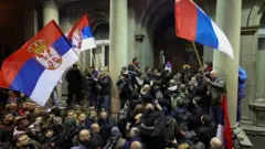 Supporters of the opposition Serbia Against Violence (SPN) protest in front of Belgrade city hall