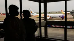 Airport authorities wearing protective gears at Don Mueang airport