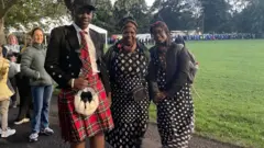 Daniel, Elizabeth et Angel Mbulaiteye