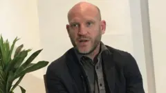 Qorataan ol-aanaa Internaashinaal Kiraaysiis Giruup (ICG) Wiiliyaam Daaviinsan