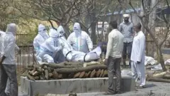 A Covid patient being cremated in Ghaziabad in Uttar Pradesh