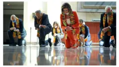 Democrats kneel in moment of silence for George Floyd