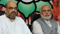 નરેન્દ્ર મોદી અને અમિત શાહ