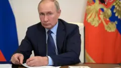 Путін