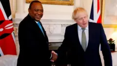 ኡሁሩ ኬንያታ (ጸጋም) ቦሪስ ጆንሰን (የማን)