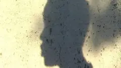 Shadow photo of young woman