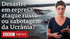 Foto da represa rompida, repórter Laís Alegretti e o texto - Desastre em represa: ataque russo ou sabotagem na Ucrânia