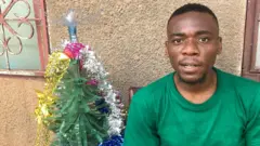 Plastic bottle Christmas tree don make son orphans dem smile