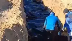 Una fosa común en Bucha