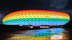 Allianz Arena lit up in rainbow colours
