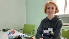 Katya, a volunteer aid worker at the centre for Ukrainian refugees