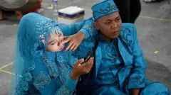 Pasangan mempelai pria dan wanita