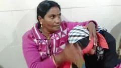 મહિલા