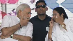 ममता बनर्जी और नरेंद्र मोदी