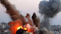 Smoke billowing into sky after attack on Gaza City