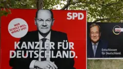 Election posters of Germany"s top candidates for chancellor