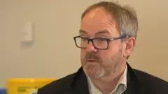 Prof Heneghan
