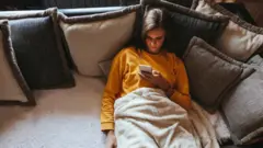 Woman scrolling phone