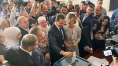 الأسد يدلي بصوته