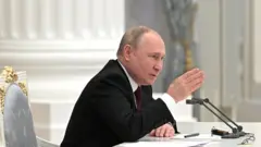 Путин