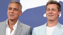 Džordž Kluni i Bred Pit