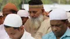 Men at prayer, Gurugram