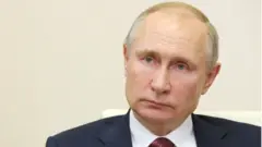 Путін