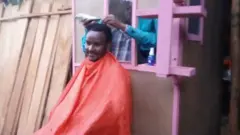 Nwoke eji osisi nkewa akpú isi