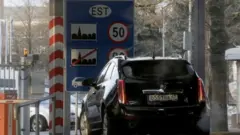 Car at Estonia-Russia border crossing at Narva