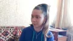 A screen grab from a video released by local activists showing 12-year-old Masha, who was last seen in public on 1 March