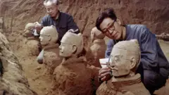 Workers at the excavation site