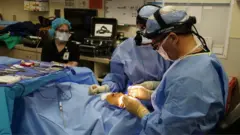 A person has cosmetic surgery in the US