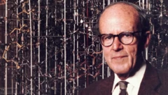Max Perutz frente a un modelo de una estructura molecular