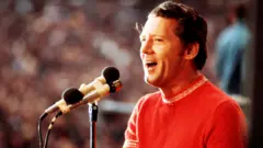 Jerry Lee Lewis performs on stage at the London Rock'n'Roll Show, Wembley, London, 5th August 1972