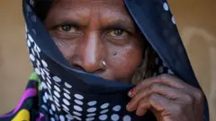 મહિલા