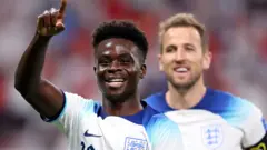 Bukayo Saka celebrates