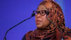 Perezida Samia Hassan avuga ko yumva ko yahemukiwe n'abanegura reta yiwe yakiriye aya madeni mvamahanga