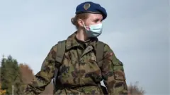 Swiss army reservists wearing protective face masks, 8 November 2020
