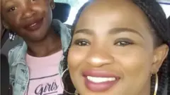 Bongekile Msibi y su hija.