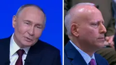 青い背景の前に座り話すプーチン氏と、客席でそれを聞いているBBCのローゼンバーグ記者