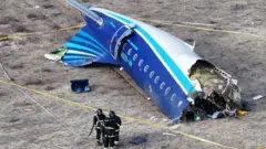 One drone view show rescue workers for di crash site of one Azerbaijan Airlines passenger plane on 25 December