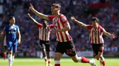 Trai Hume celebrates scoring for Sunderland