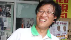 區錦新在澳門街頭為立法會選舉宣傳拉票（2013）