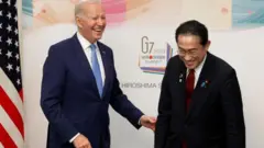 জি-সেভেন বৈঠকে প্রেসিডেন্ট বাইডেন ও জাপানের প্রধানমন্ত্রী ফুমিও কিশিদা