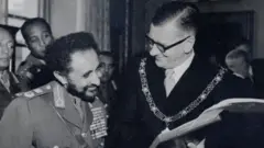 ሃጸይ ሃይለስላሰ ምስ ከንቲባ ከተማ ባዝ ዊሊያም ጋሎፕ 