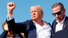 Trump with blood for im face
