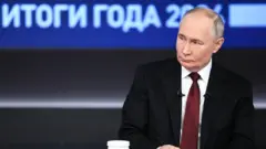 Володимир Путін