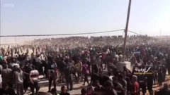 በሺህዎች የሚቆጠሩ ጋዛዊያን እርዳታ ማሰራጫ ጣቢያው ሲገቡ
