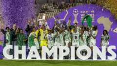 Nigeria vs Morocco, Nigeria national team dey celebrate wit di trophy afta dem win di 2024 Women's Africa Cup of Nations final football match.
